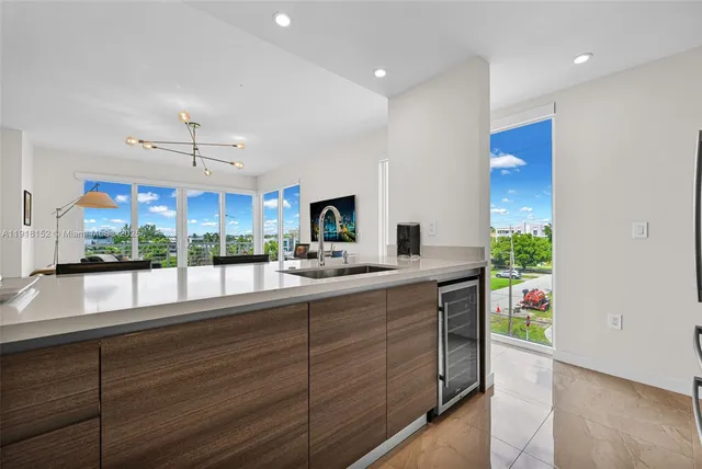 a kitchen with a stove and a microwave