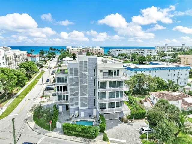 a view of a balcony with a chair