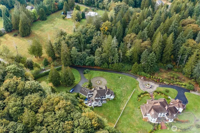 an aerial view of a golf course with parking space