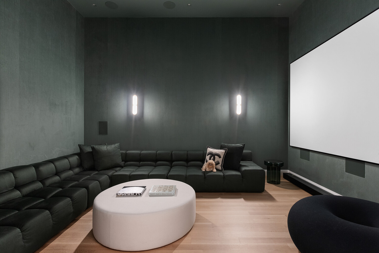 83 Spring Street, Unit 3 Manhattan, NY 10012 - Photo 9 of 24 a living room with furniture and a lamp