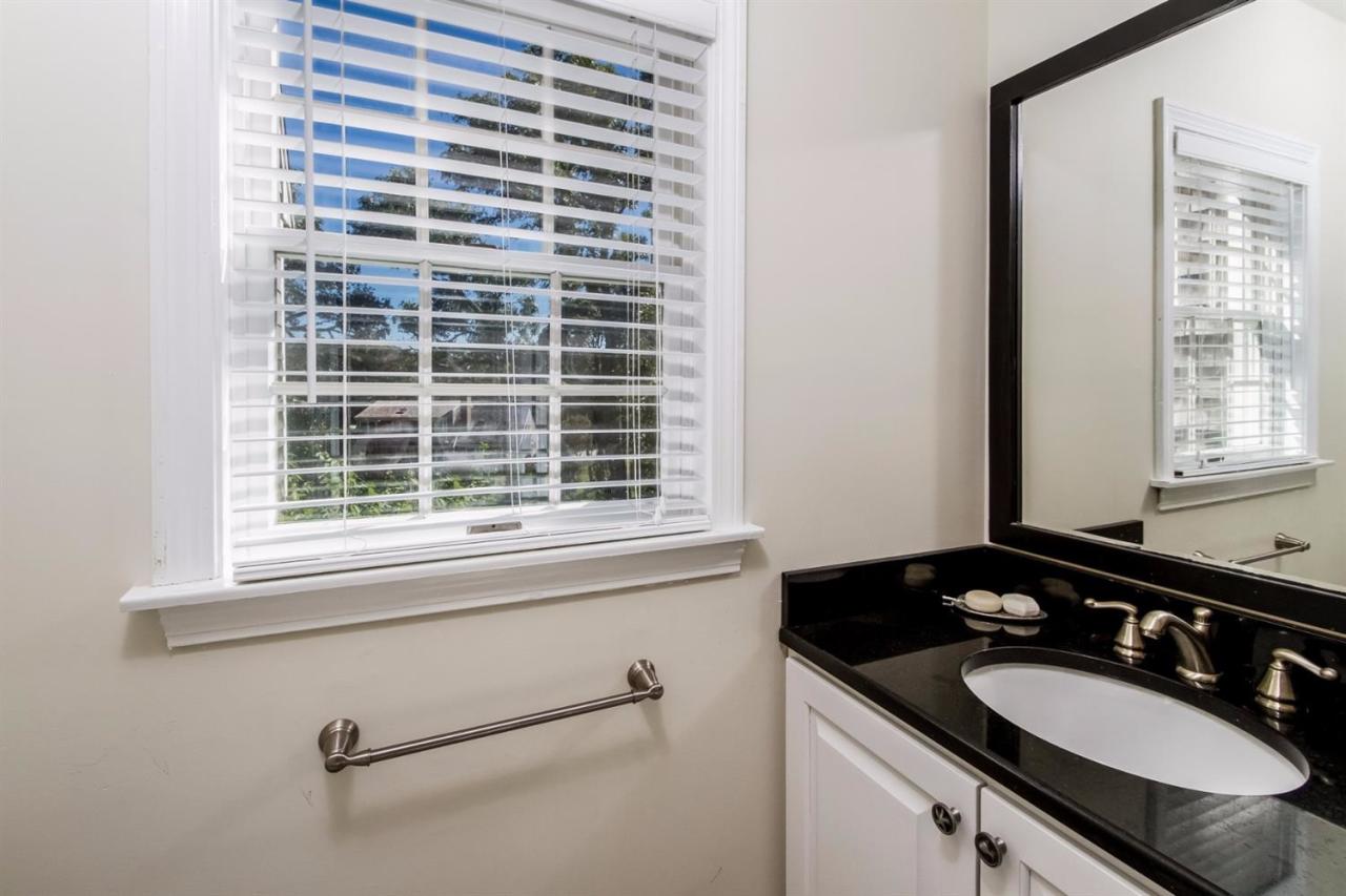 41 Harbor Hill Road Chatham, MA 02633 - Photo 17 of 35 a bathroom with a granite countertop sink and a mirror