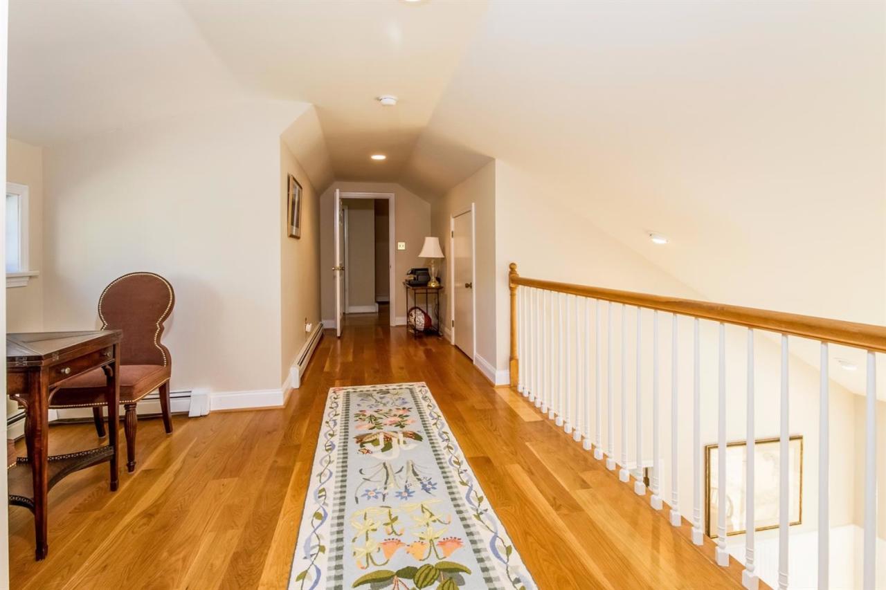41 Harbor Hill Road Chatham, MA 02633 - Photo 18 of 35 a very nice looking room with wooden floor and furniture