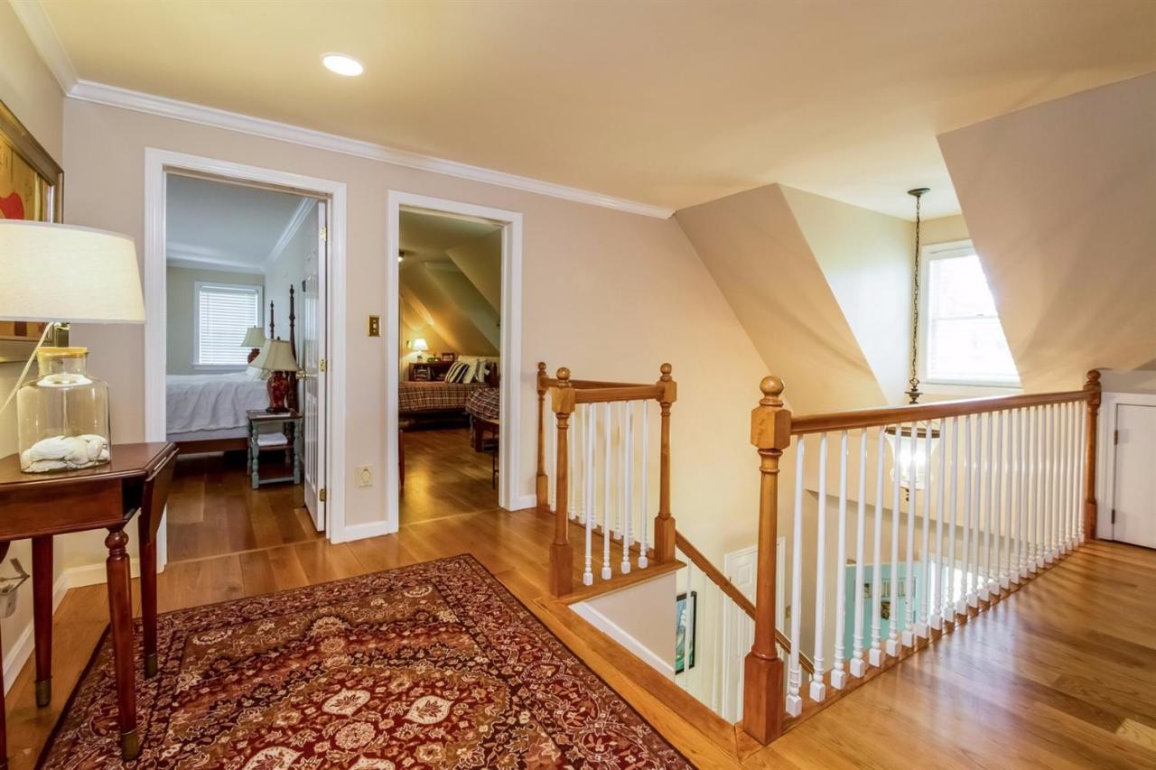 41 Harbor Hill Road Chatham, MA 02633 - Photo 19 of 35 a view of a hallway view with living room and wooden floor