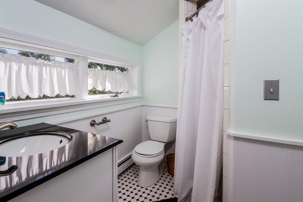 41 Harbor Hill Road Chatham, MA 02633 - Photo 22 of 35 a bathroom with a sink a toilet and a window