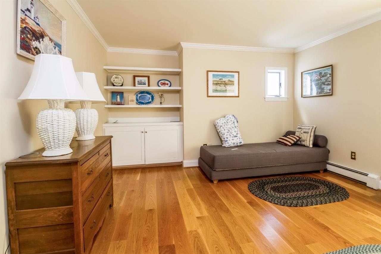 41 Harbor Hill Road Chatham, MA 02633 - Photo 25 of 35 a bedroom with a bed and a dresser