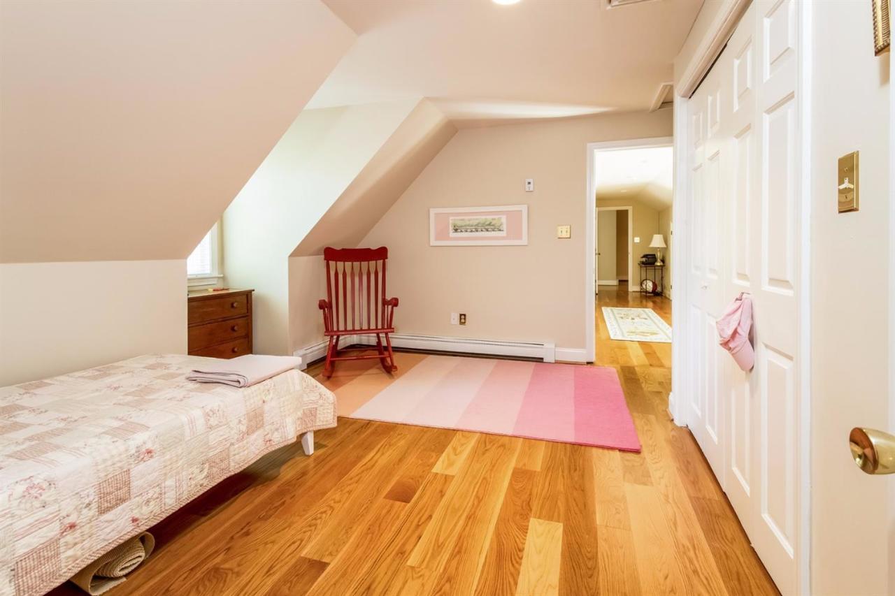 41 Harbor Hill Road Chatham, MA 02633 - Photo 27 of 35 a bedroom with a bed and a view of balcony