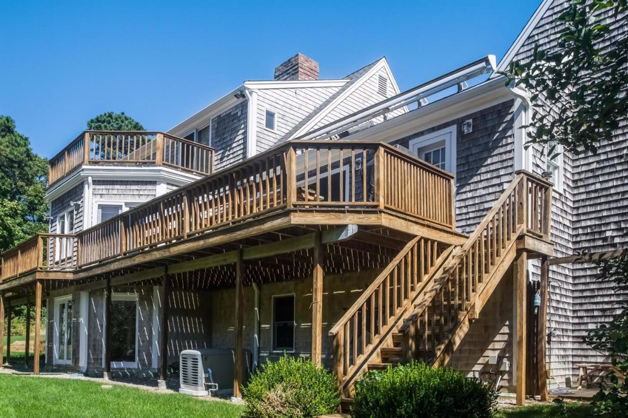 41 Harbor Hill Road Chatham, MA 02633 - Photo 4 of 35 a view of a house with wooden stairs