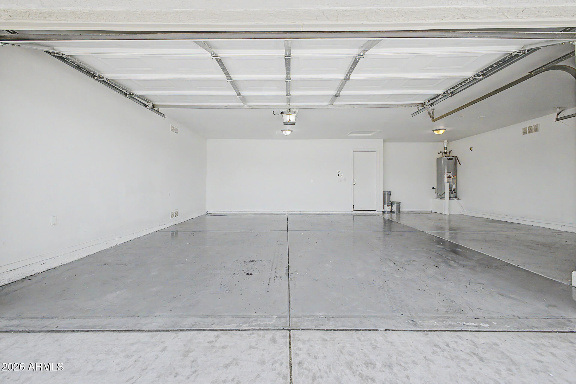 11199 West Monte Vista Road Avondale, AZ 85392 - Photo 26 of 36 a view of a room with racks on the wall