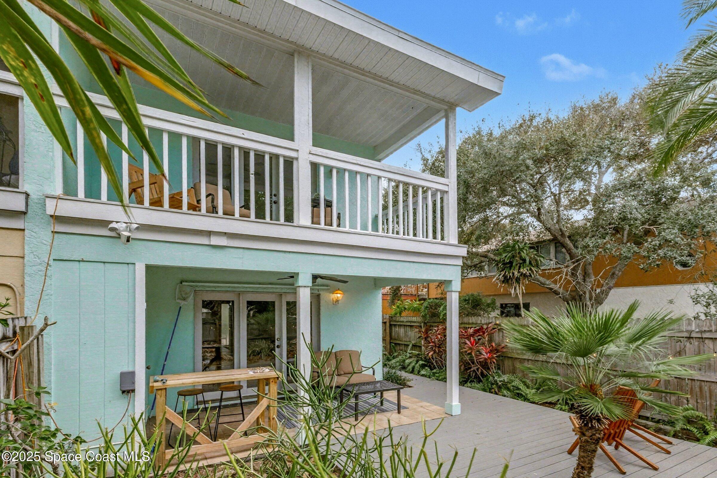 24 Olive Street Cocoa Beach, FL 32931 - Photo 33 of 50 a view of a house with a patio