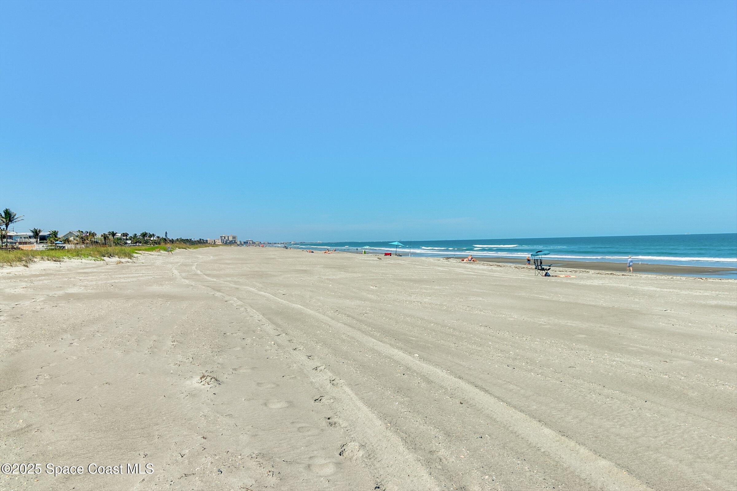24 Olive Street Cocoa Beach, FL 32931 - Photo 39 of 50 a view of an ocean and beach