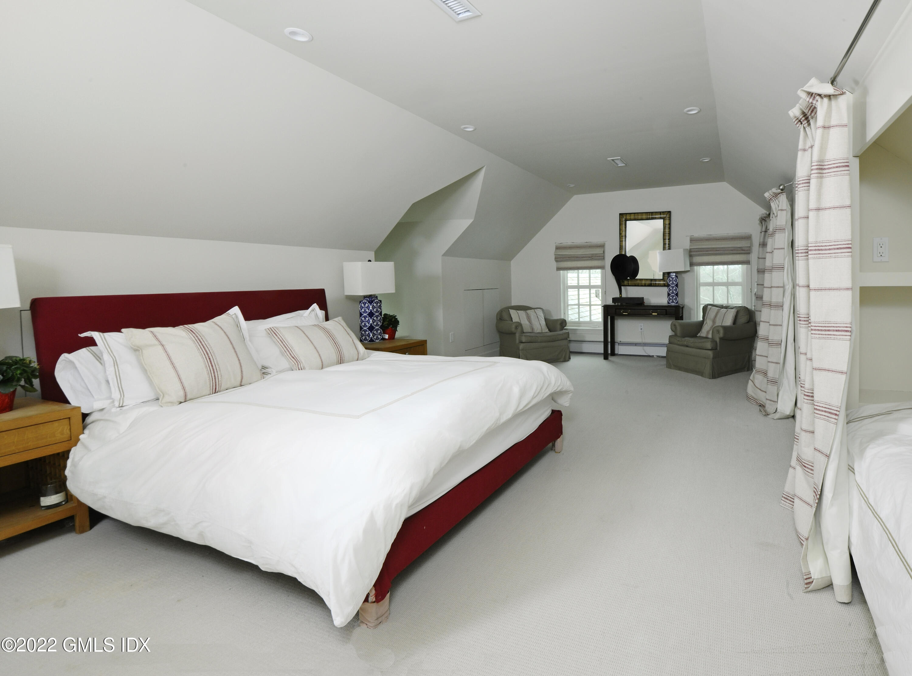 331 Round Hill Road Greenwich, CT 06831 - Photo 14 of 28 a bedroom with bed and a couch