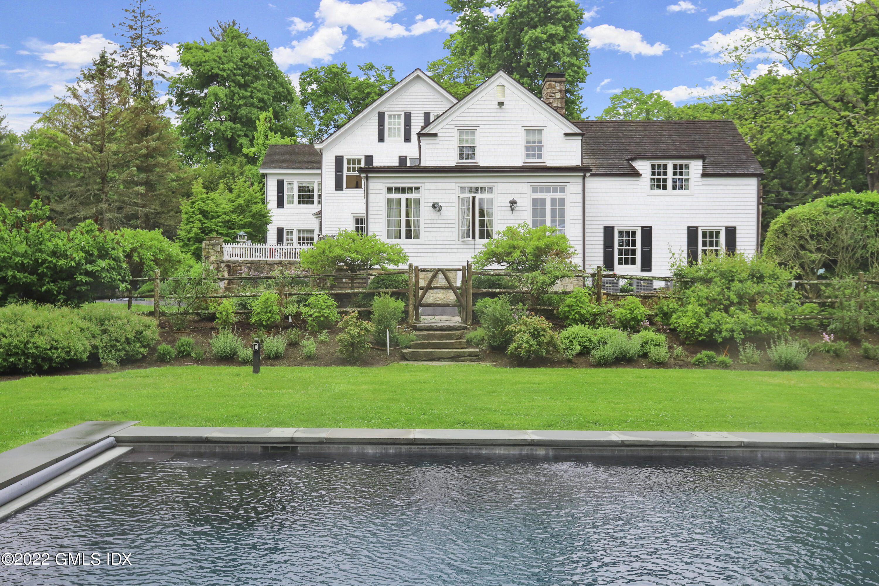 331 Round Hill Road Greenwich, CT 06831 - Photo 2 of 28 a view of outdoor space yard and front view of a house