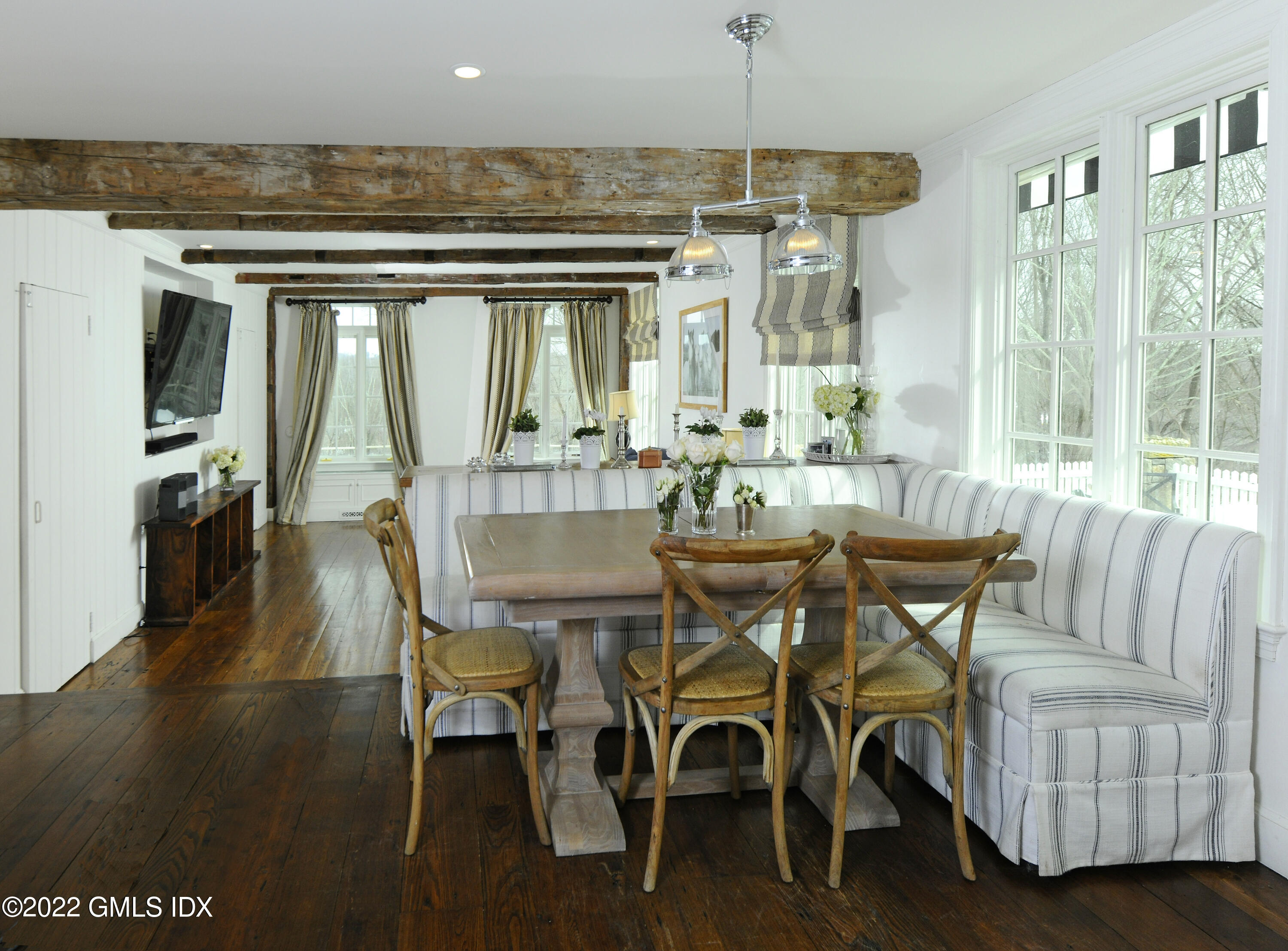 331 Round Hill Road Greenwich, CT 06831 - Photo 5 of 28 a view of a dining room with furniture window and wooden floor