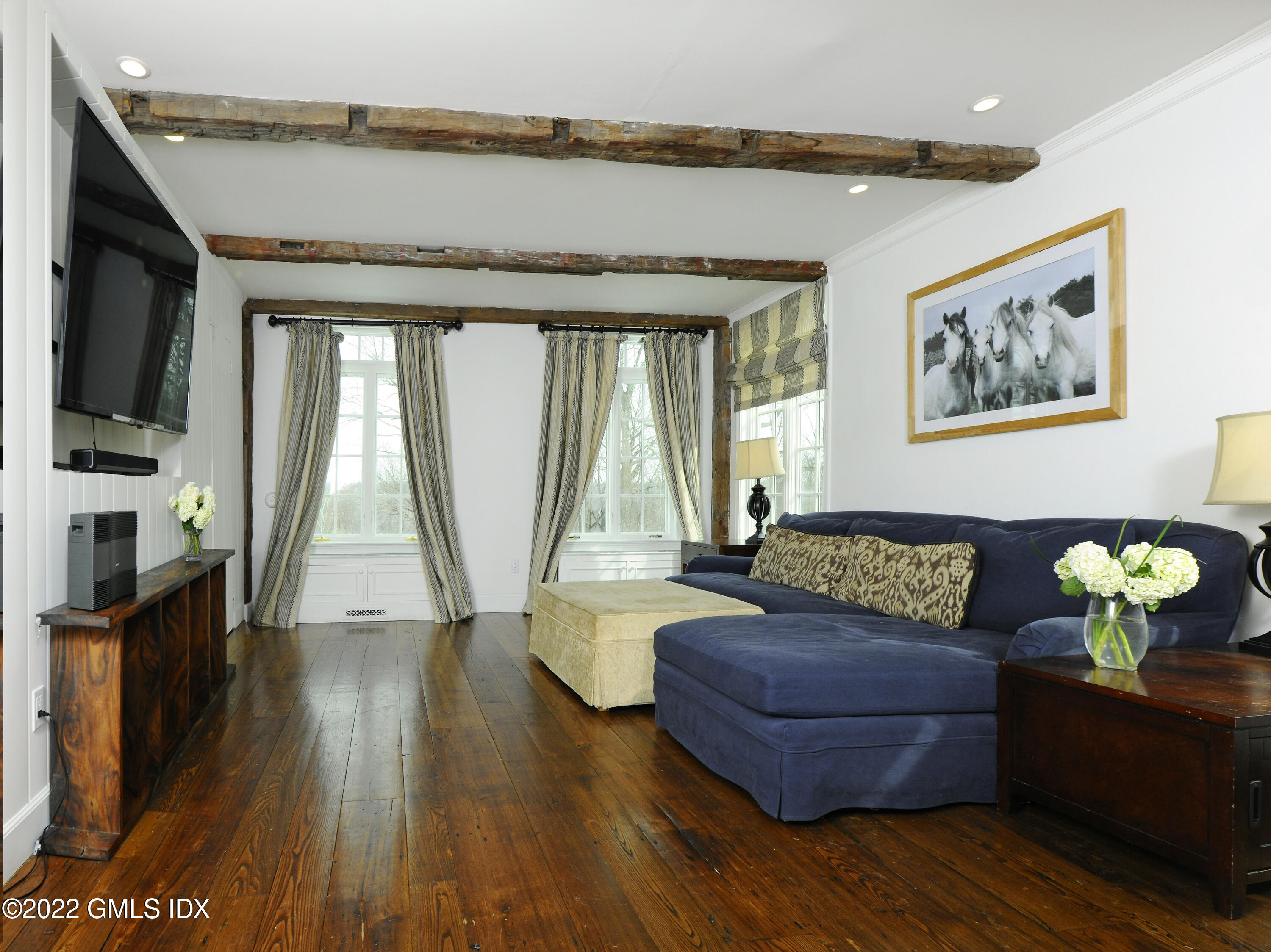 331 Round Hill Road Greenwich, CT 06831 - Photo 6 of 28 a living room with furniture and a flat screen tv