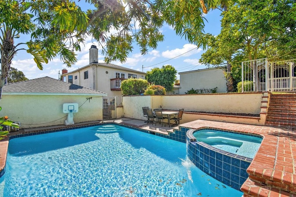 6027 West 76th Street Los Angeles, CA 90045 - Photo 26 of 36 Pool Area with stairway to Terrace 3