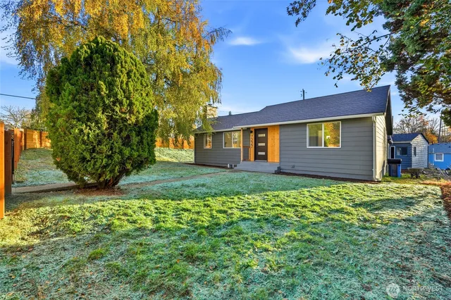front view of a house with a yard