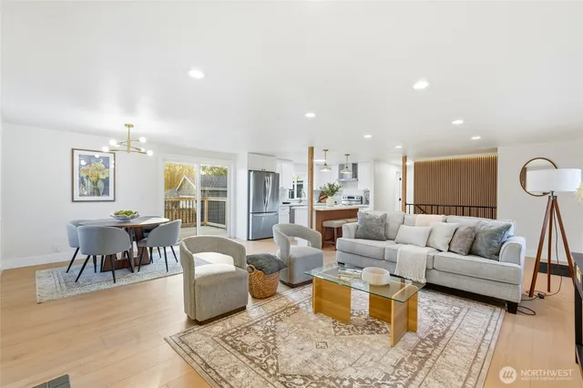 a living room with furniture and a table