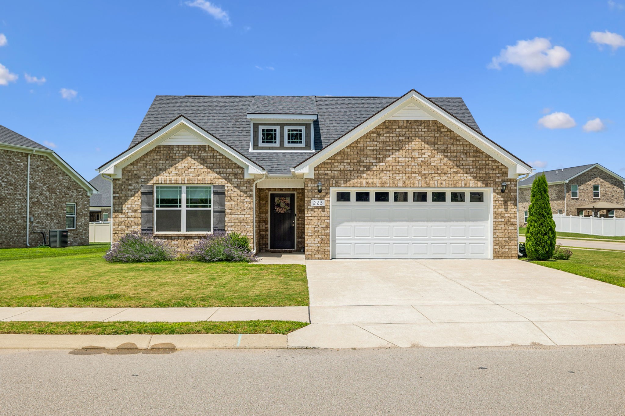 225 Thorpe Dr Spring Hill Spring Hill, TN 37174 - Photo 1 of 33 a front view of a house with a yard
