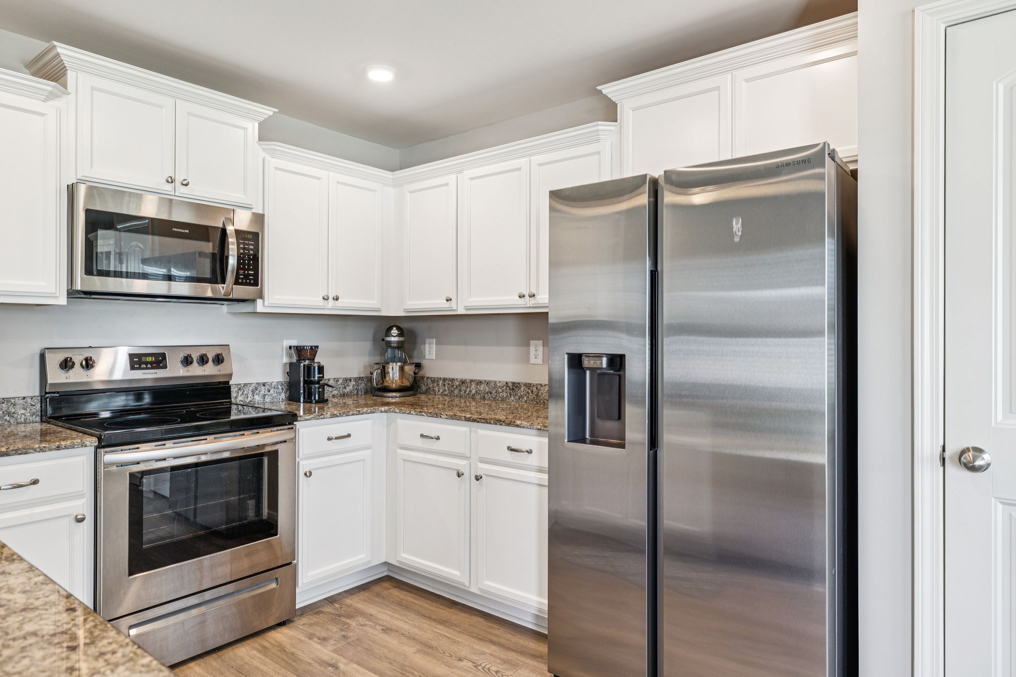 225 Thorpe Dr Spring Hill Spring Hill, TN 37174 - Photo 16 of 33 a kitchen with cabinets stainless steel appliances and a counter space