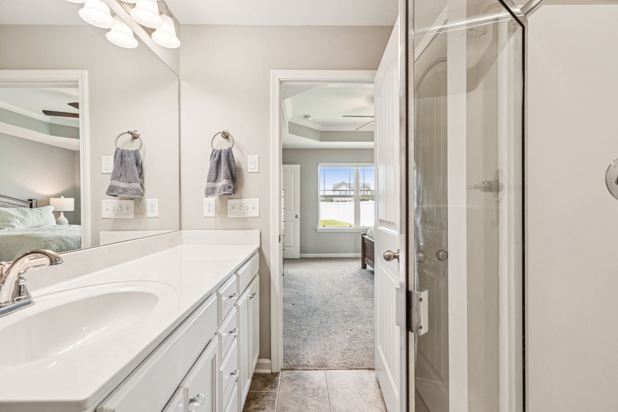 225 Thorpe Dr Spring Hill Spring Hill, TN 37174 - Photo 21 of 33 a bathroom with a sink and a mirror