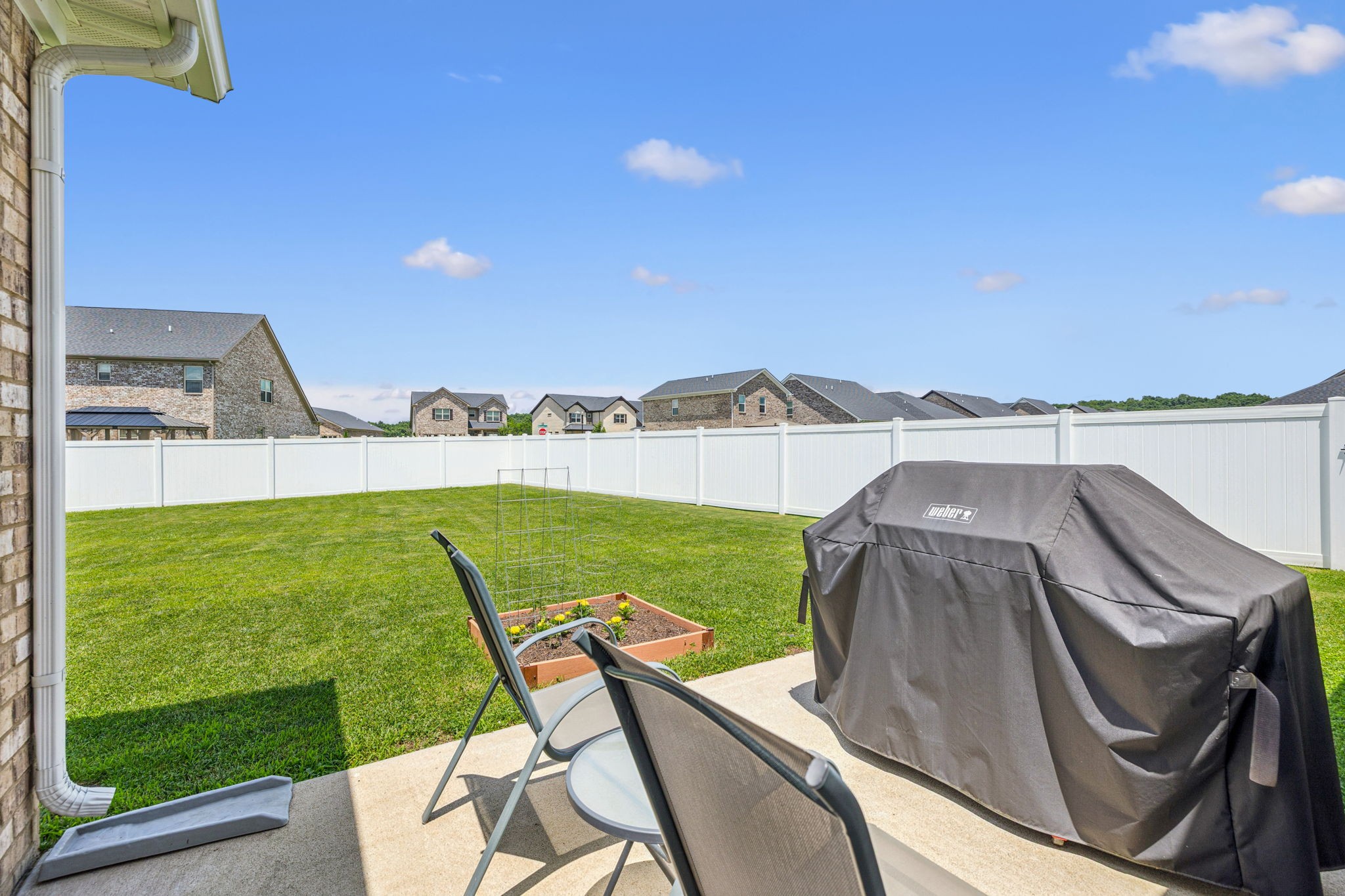 225 Thorpe Dr Spring Hill Spring Hill, TN 37174 - Photo 25 of 33 a view of a chairs and table in the patio