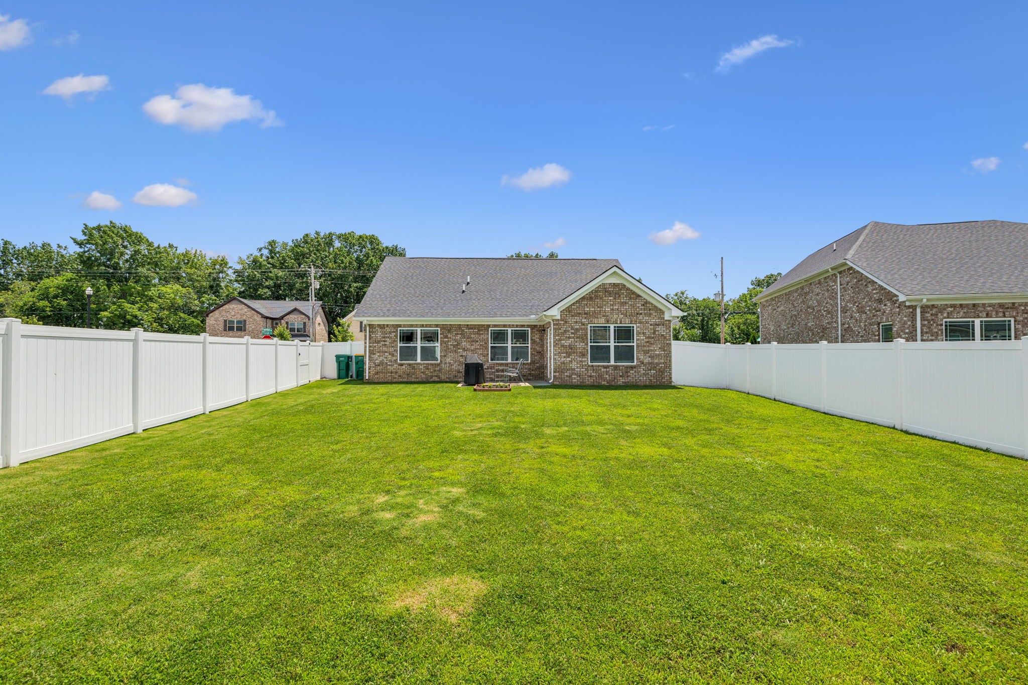 225 Thorpe Dr Spring Hill Spring Hill, TN 37174 - Photo 28 of 33 a front view of a house with yard and garage