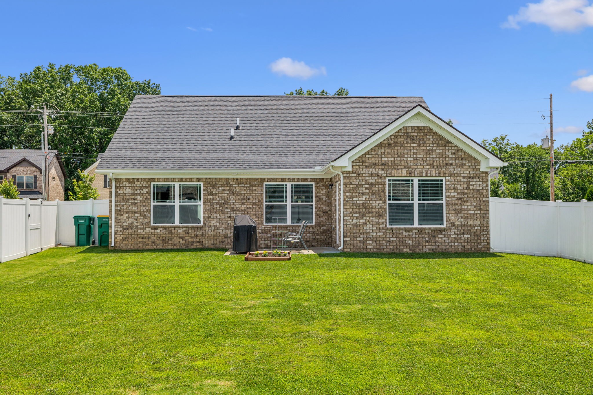 225 Thorpe Dr Spring Hill Spring Hill, TN 37174 - Photo 29 of 33 a view of a house with a yard and sitting area