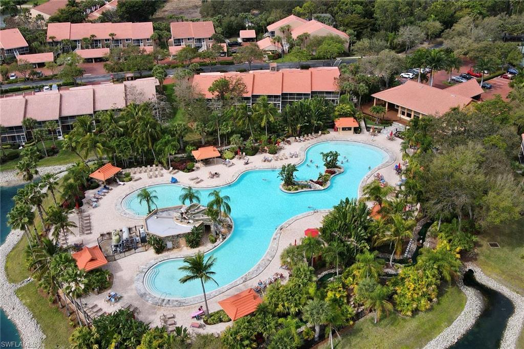 2370 Hidden Lake Court, Unit 8301 Naples, FL 34112 - Photo 19 of 21 Aerial view of community pool