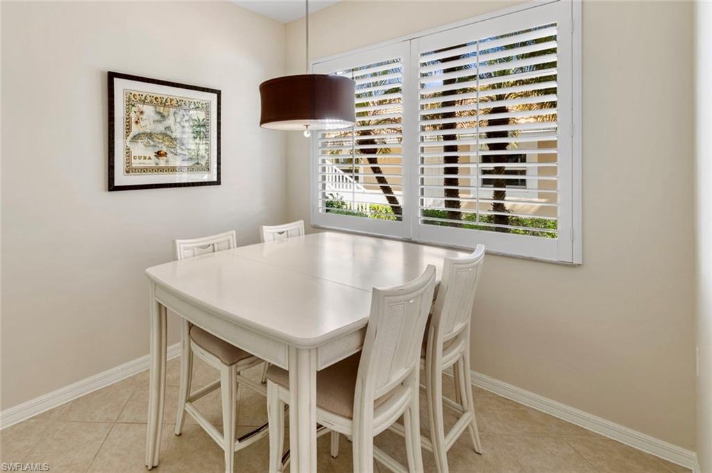 2370 Hidden Lake Court, Unit 8301 Naples, FL 34112 - Photo 7 of 21 Kitchen dining area