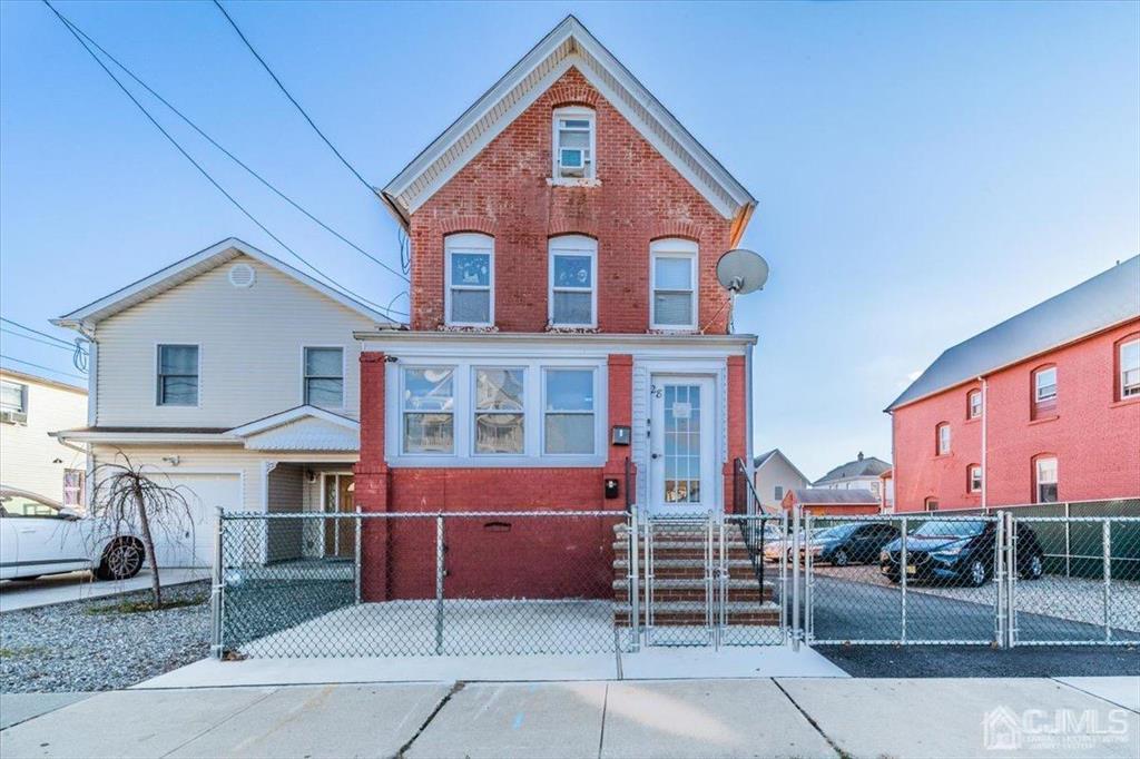 28 Union Street Carteret, NJ 07008 - Photo 1 of 25 a view of a house with a yard