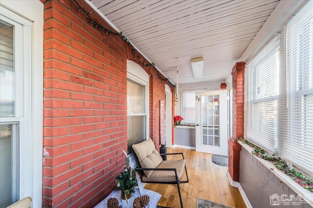 28 Union Street Carteret, NJ 07008 - Photo 2 of 25 a porch with outdoor seating