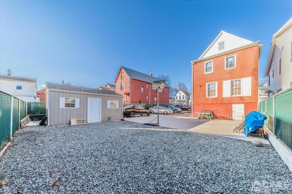 28 Union Street Carteret, NJ 07008 - Photo 23 of 25 a view of a house with a backyard and windows
