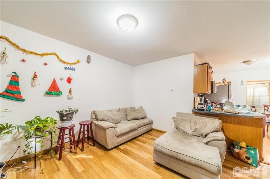 28 Union Street Carteret, NJ 07008 - Photo 3 of 25 a living room with furniture and a couch