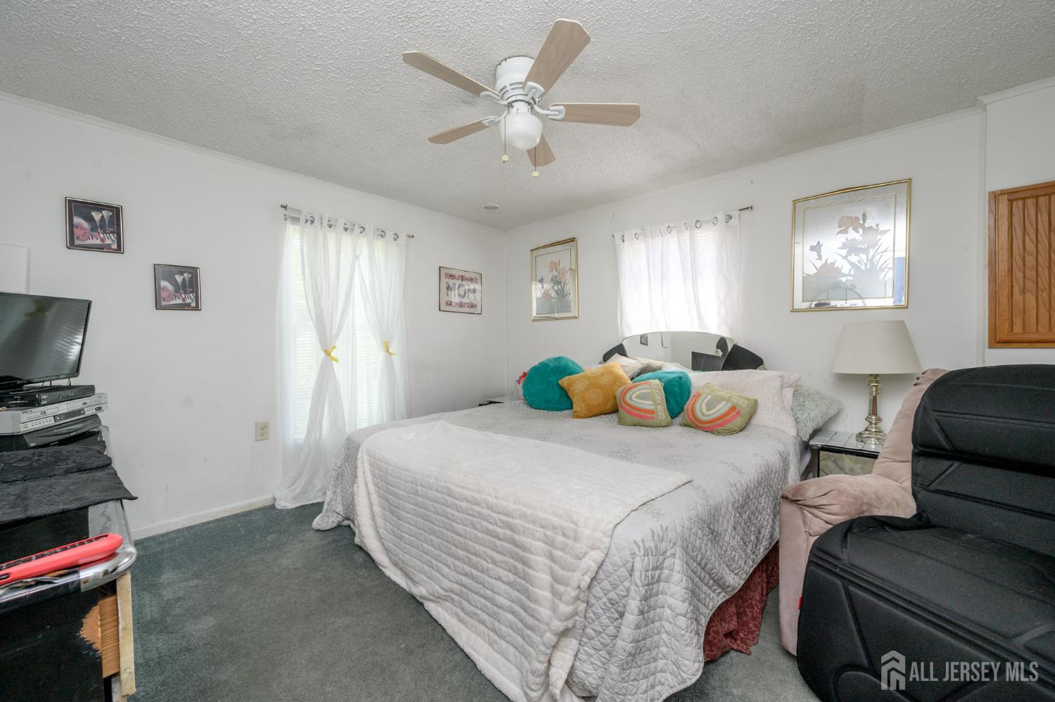 8 Snow Chief Court Howell, NJ 07731 - Photo 18 of 26 a bedroom with a bed and furniture