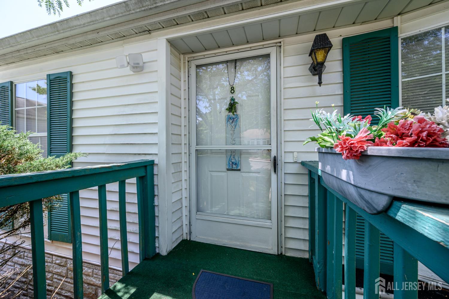 8 Snow Chief Court Howell, NJ 07731 - Photo 2 of 26 a view of a porch with furniture