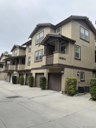 a front view of a house with a garage