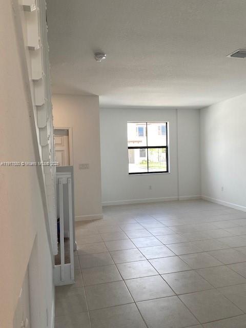 10166 Southwest 228th Terrace Miami, FL 33190 - Photo 27 of 29 a view of empty room with windows