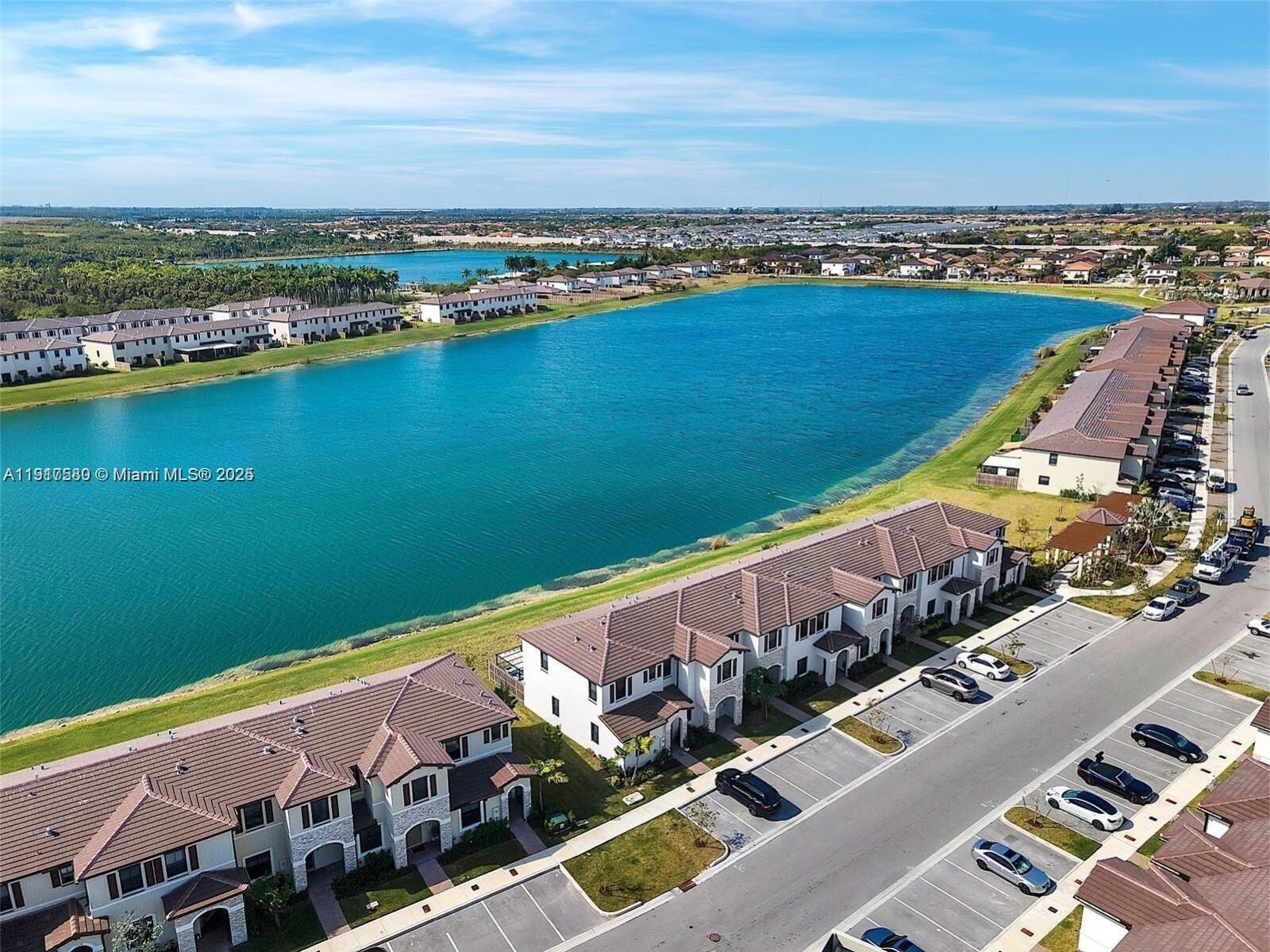 10166 Southwest 228th Terrace Miami, FL 33190 - Photo 3 of 29 a view of a balcony with an ocean