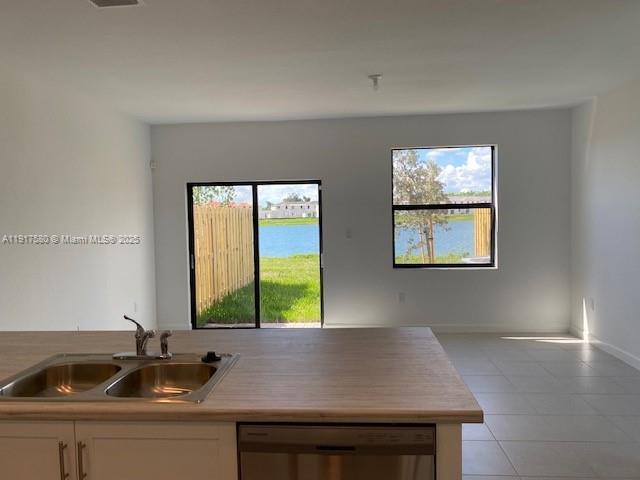 10166 Southwest 228th Terrace Miami, FL 33190 - Photo 10 of 29 a view of kitchen sink window and cabinets
