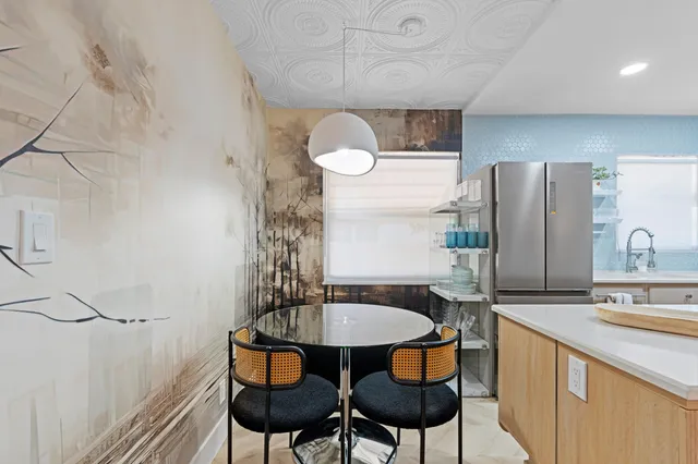 a table and chairs in a kitchen
