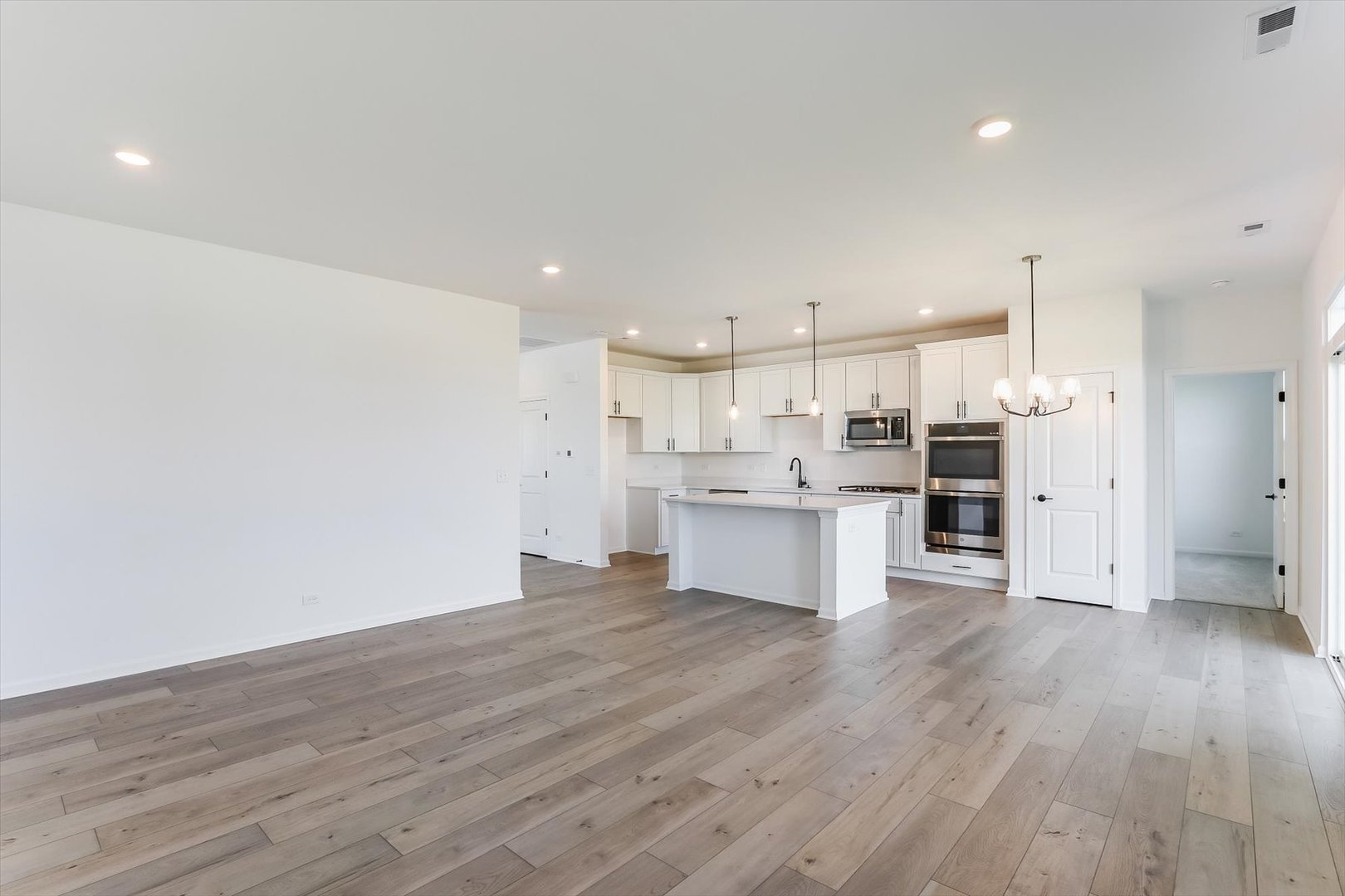 730 Alberta Avenue Oswego, IL 60543 - Photo 10 of 29 a view of kitchen with wooden floor