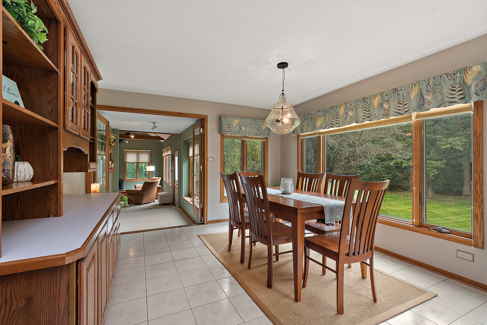 590 Timber Lane Frankfort, IL 60423 - Photo 15 of 50 a view of a dining room with furniture window and outside view