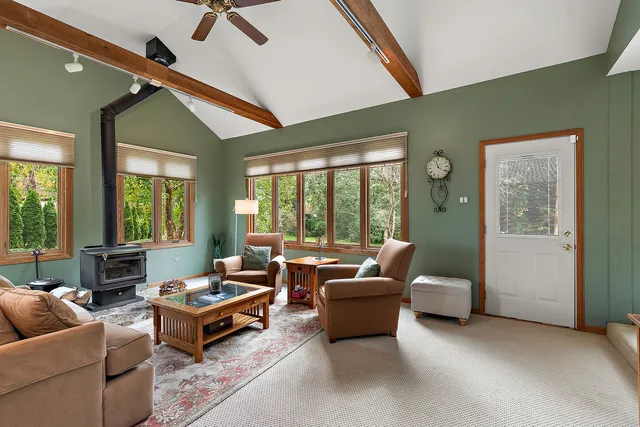 a work room with furniture and wooden floor