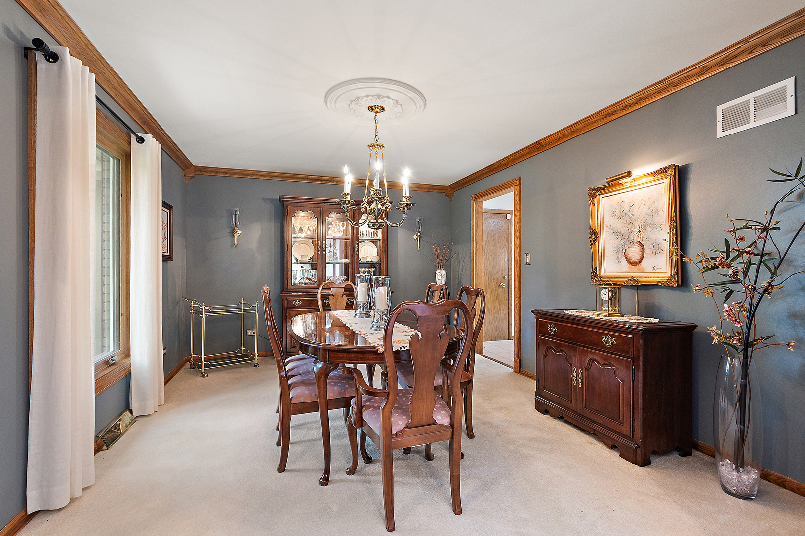 590 Timber Lane Frankfort, IL 60423 - Photo 6 of 50 a view of a dining room with furniture and chandelier