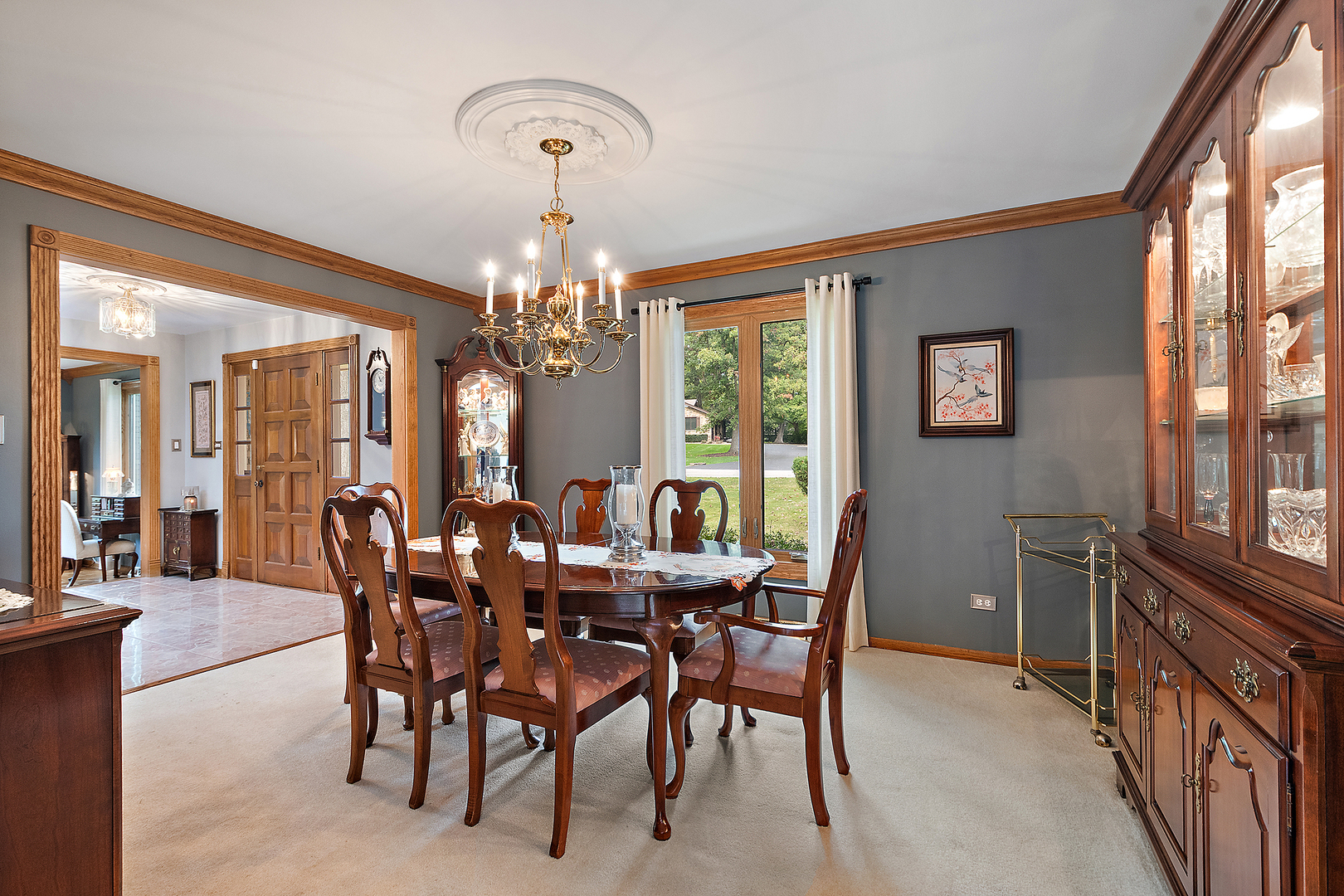 590 Timber Lane Frankfort, IL 60423 - Photo 7 of 50 a view of a dining room with furniture and chandelier