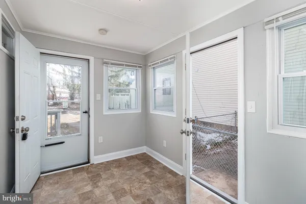 a view of an empty room and window