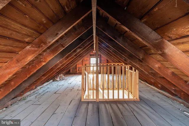 a view of balcony with wooden floor
