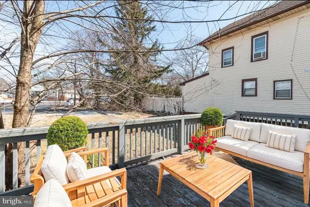 a view of a deck with a yard