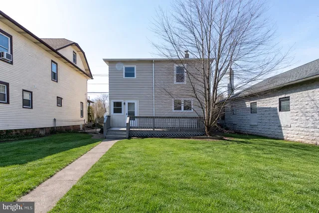 a view of a back yard of the house