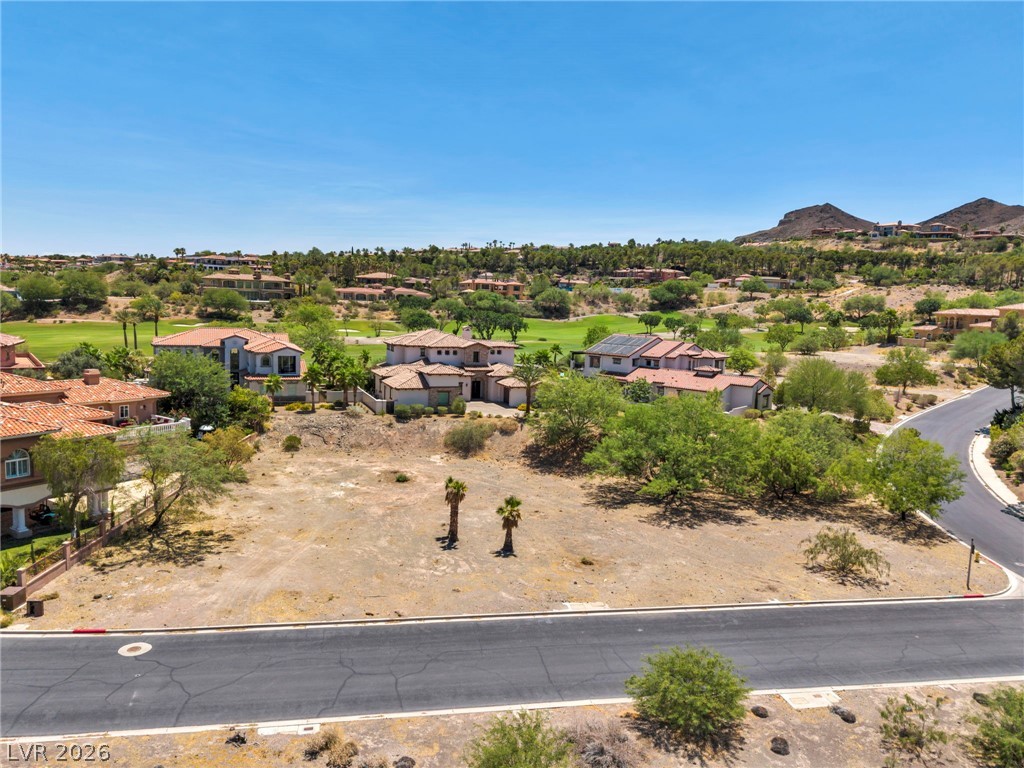 3 Rue Promenade Way Henderson, NV 89011 - Photo 6 of 26 A prime building site offers commanding golf course and mountain views in a serene setting.